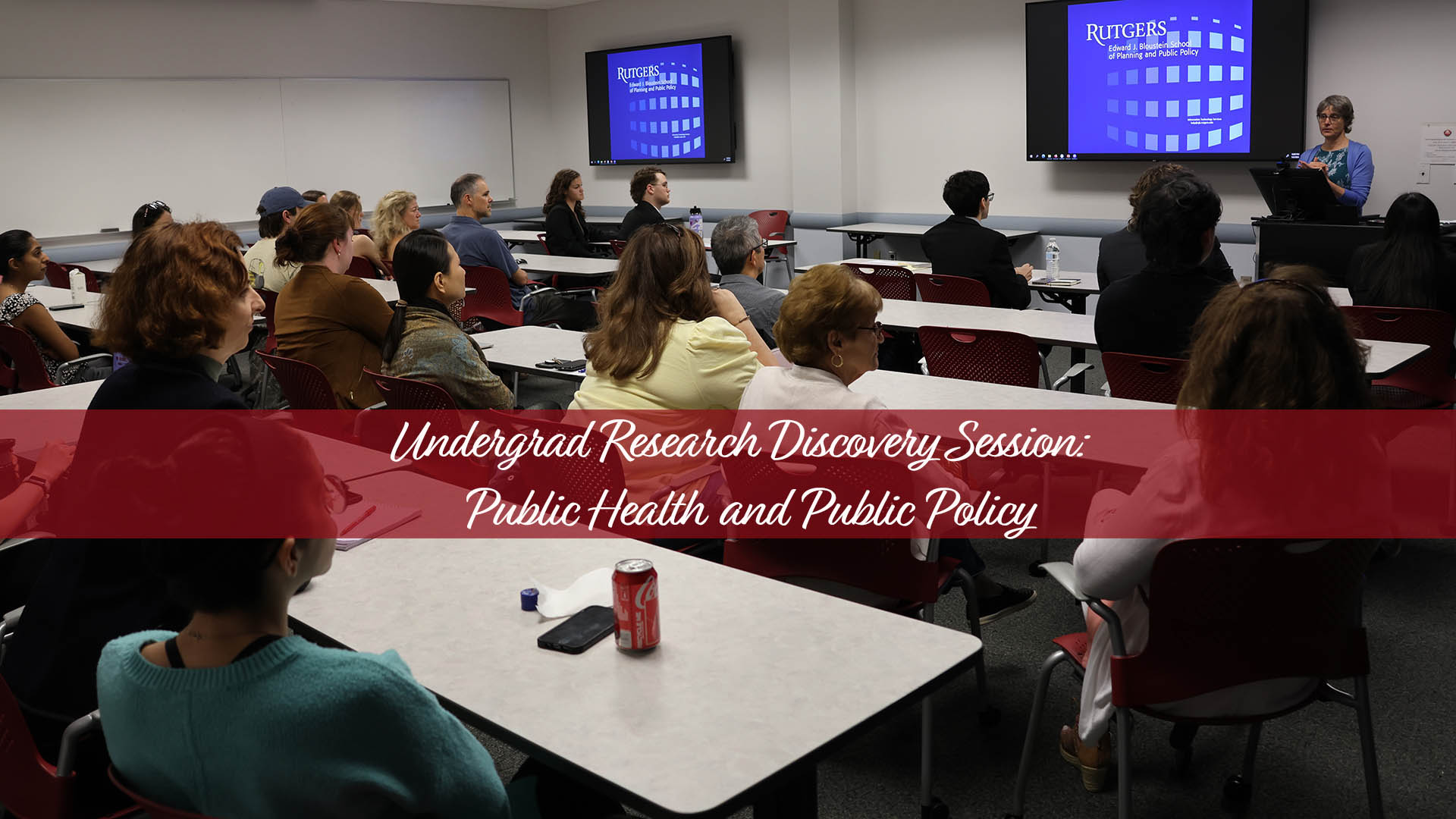 fall-2024-research-undergrads room of people listening to a presentation